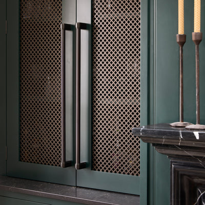 Features our Perforated Diamond Grille in our antique brass unlacquered (ABL) grille finish | Project by Provincial Kitchens Home.