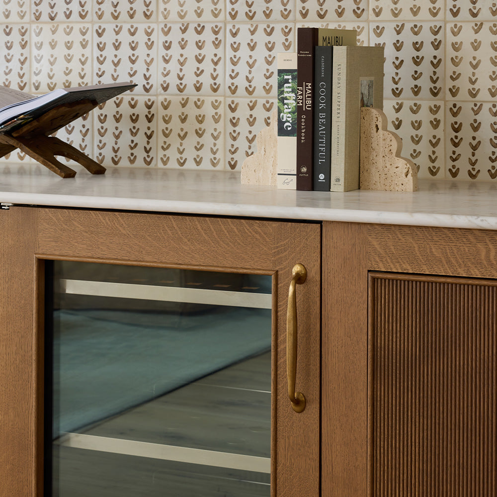 Design by Town & Country | Photography by Tori Sikkema | Bakes cabinet handle shown in our aged brass (BEL) finish.