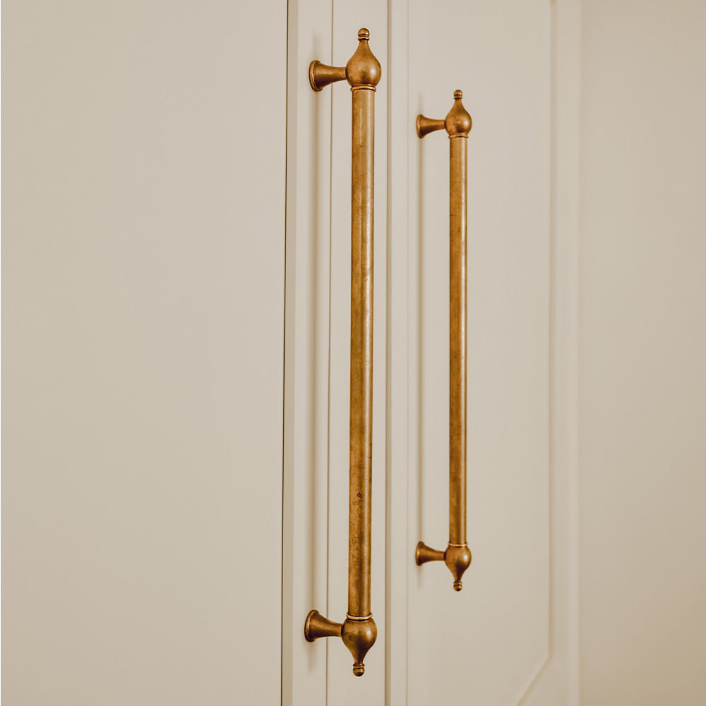 Design by Cabinet Plant | Belgrave appliance pull shown in our aged brass (BEL) finish.