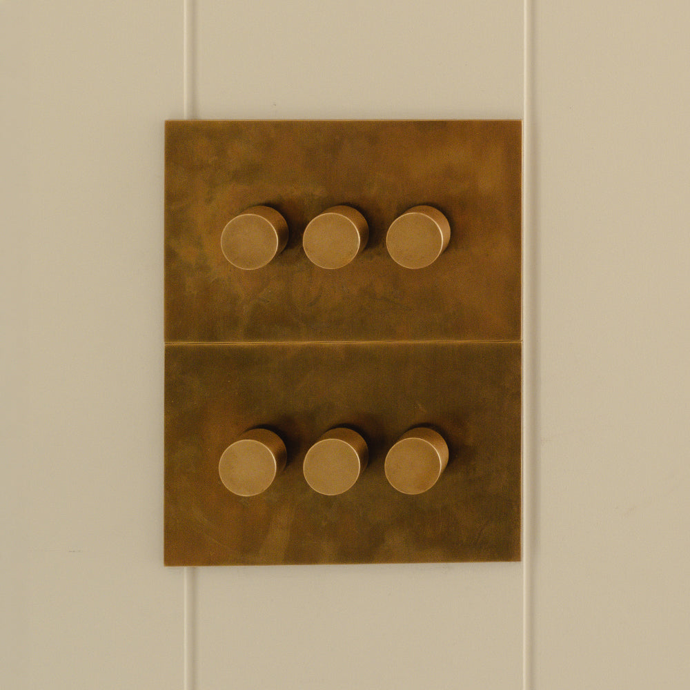 Design by House Nine | Photography by Joey Kendal Brown | Chamberlain Plain 3G Dimmer Switches shown in our fine English antique (FEA) finish.