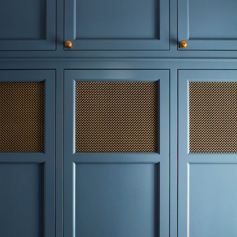Features our 10mm Diamond Interwoven Grille with 3mm Plain Wire in our antique brass lacquered (ABL) grille finish | Project by JWH Design & Cabinetry.