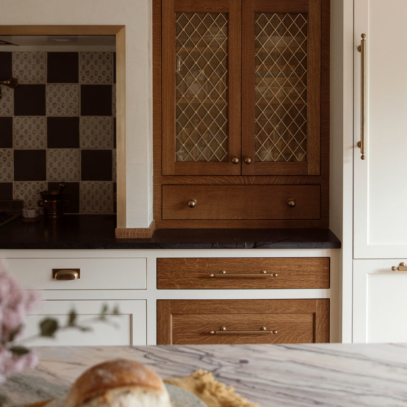 Features our Medium Regency Diamond Grille with Alternating Floral Rosettes and Coarse Mesh Backing in our satin brass unlacquered (SBUL) grille finish | Project by Emily Pueringer Design | Photography by Paige Kendall.