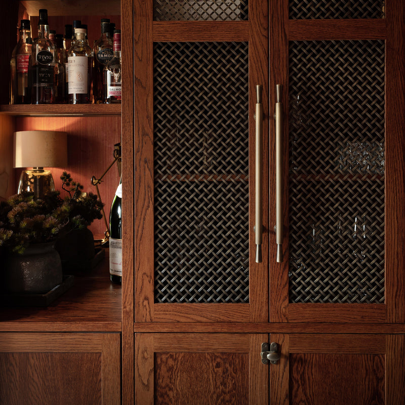 Features our 10mm Diamond Interwoven Grille with 5mm Reeded Wire in our antique brass lacquered (ABL) grille finish | Project by Studio LBI. 