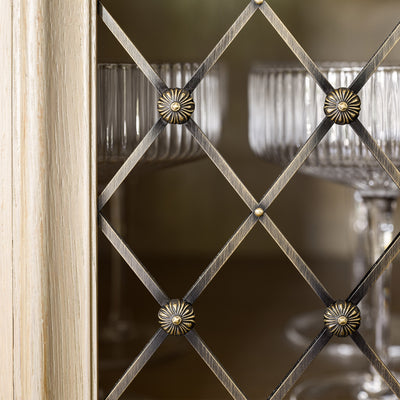 Features our Large Regency Diamond Grille with Alternating Floral Rosettes in our antique brass lacquered (ABL) grille finish | Project by McCroskey Interiors | Photography by Nate Sheets. 