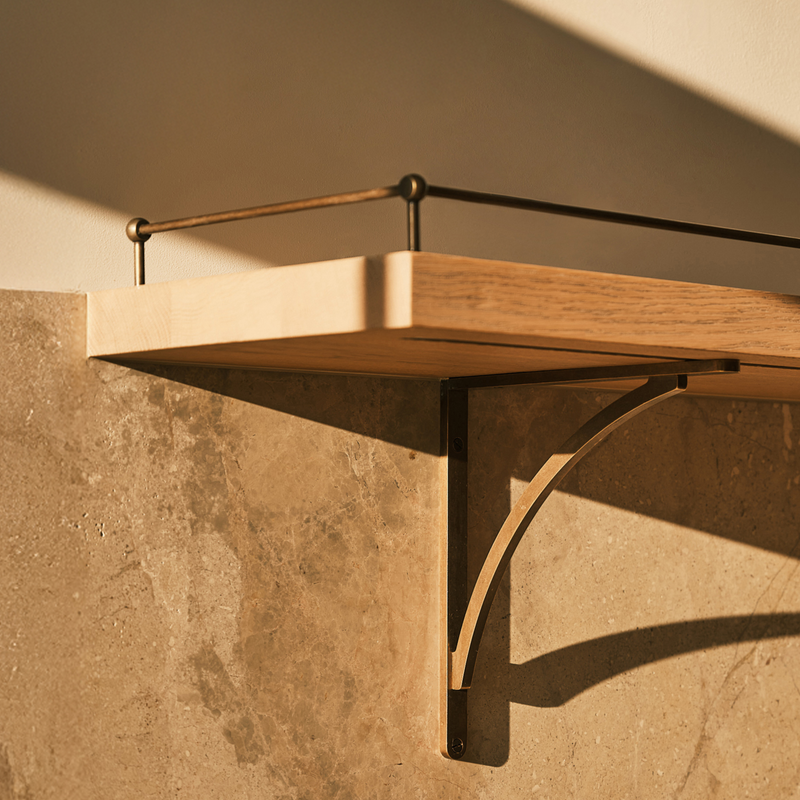 Design by Laura Butler-Madden | Photography by Patrick Butler-Madden |  Small Cotswold Gallery Shelf Rail shown in our dark aged brass (DAB) finish.