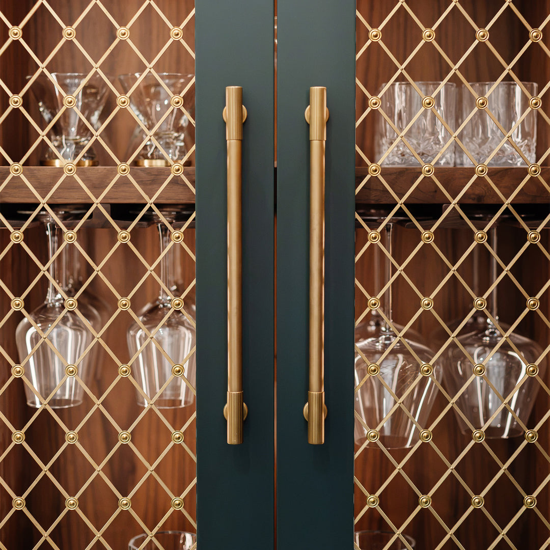 Design by Campbell Showroom | Photography by Tara Correa | Regency Diamond Grille with Plain Rosettes and Leebank Cabinet Handles shown in our satin brass unlacquered (SBUL) finish. 