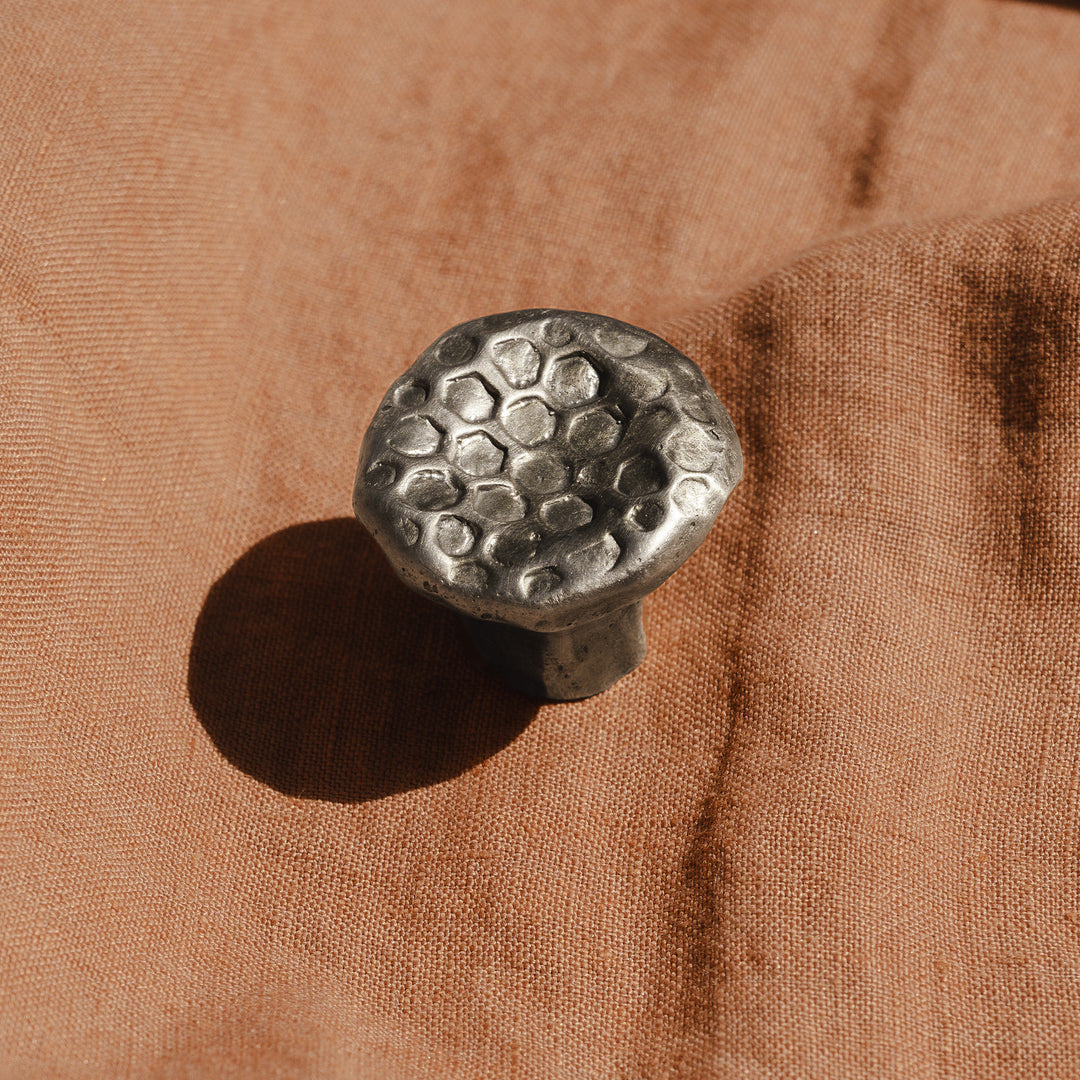 Photography by Joey Kendal Brown | 33mm Highbury Honey Cabinet Knob shown in burnished white bronze (WB). 
