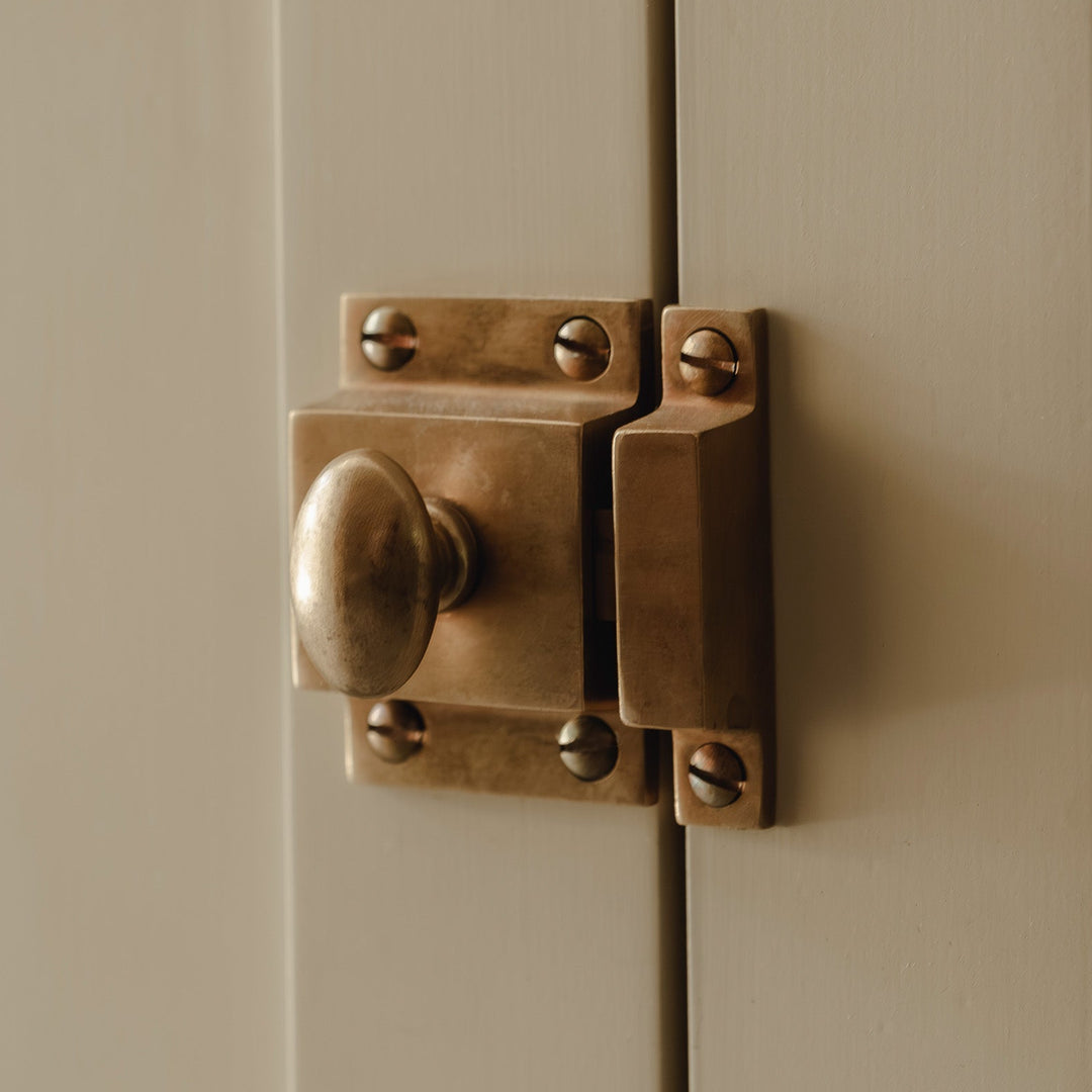 Project by House Nine Design | Photography by Joey Kendal Brown | Cotswold Cupboard Latch shown in our aged brass (BEL) finish.