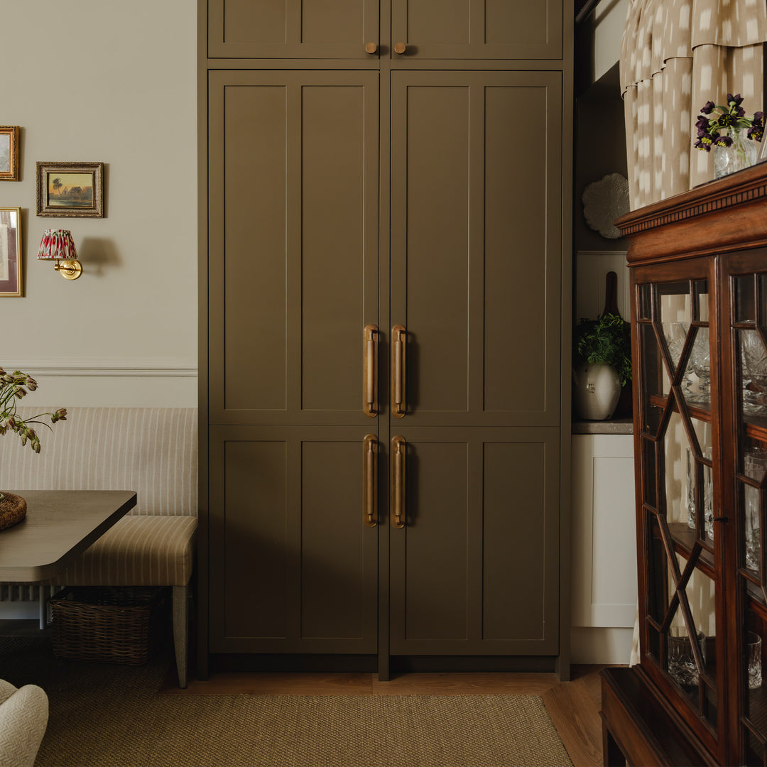 Project by Brett Calvert-Harrison | Photography by Joey Kendal Brown | Barwick Ridged Cabinet Pull Handles with Backplates and Barwick Ridged Cabinet Knobs shown in our aged brass (BEL) finish.