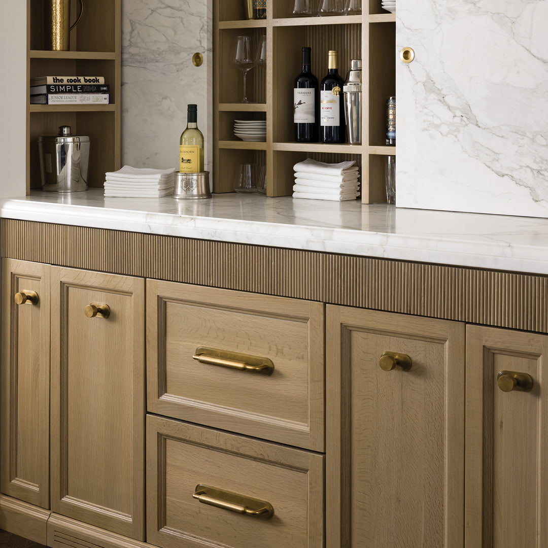 Design by McCroskey Interiors | Photography by Nate Sheets | Barwick Plain Cabinet Knob with Backplate shown in our aged brass (BEL) finish.