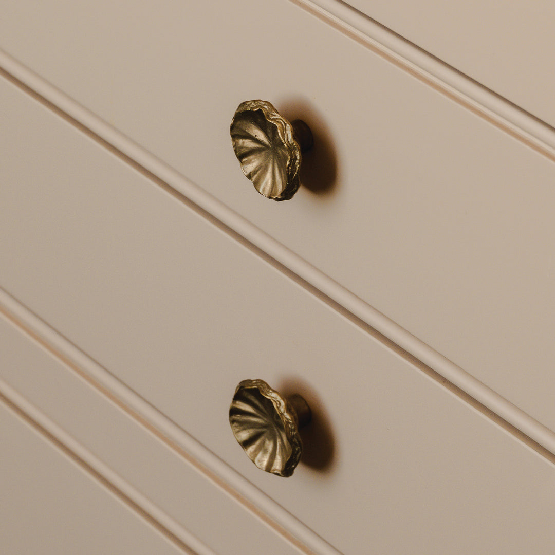 Design by St Giles Furniture | Photography by Joey Kendal Brown | Whimsical Tutu Cabinet Knob shown in silicon bronze.