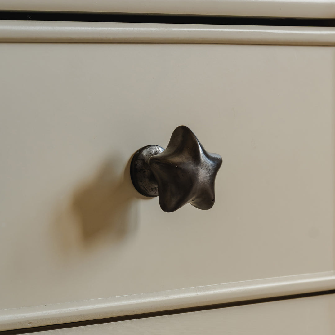 Photography by Joey Kendal Brown | Whimsical Star Cabinet Knob shown in our dark aged bronze finish.
